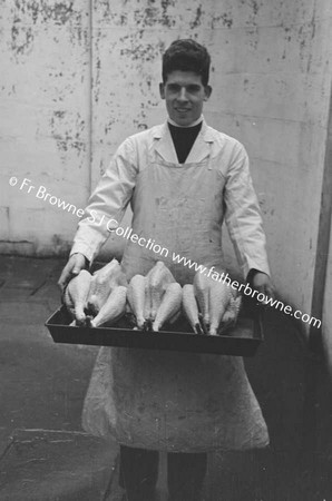 TURKEYS MAN SHOWING SPECIMENS READY FOR THE OVEN